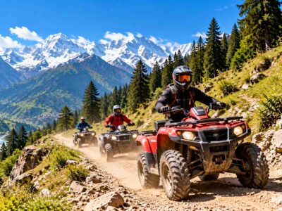ATV quad biking in Himachal Pradesh on a rugged mountain trail surrounded by pine forests and Himalayan peaks